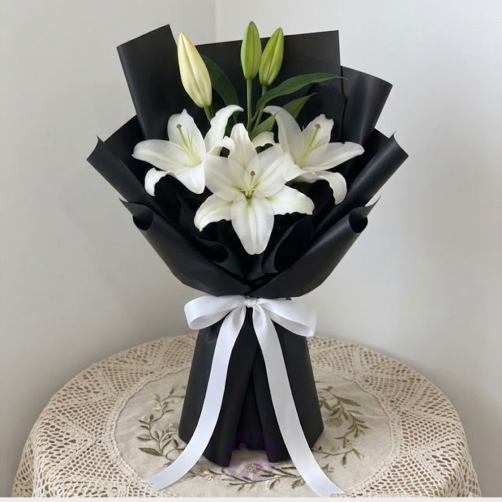 Premium White Oriental Lily Hand Bouquet in  Black Wrap